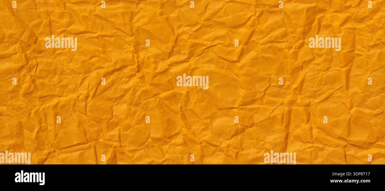 Orange Crumpled Paper Texture Background with Wrinkled Surface Pattern Stock Photo