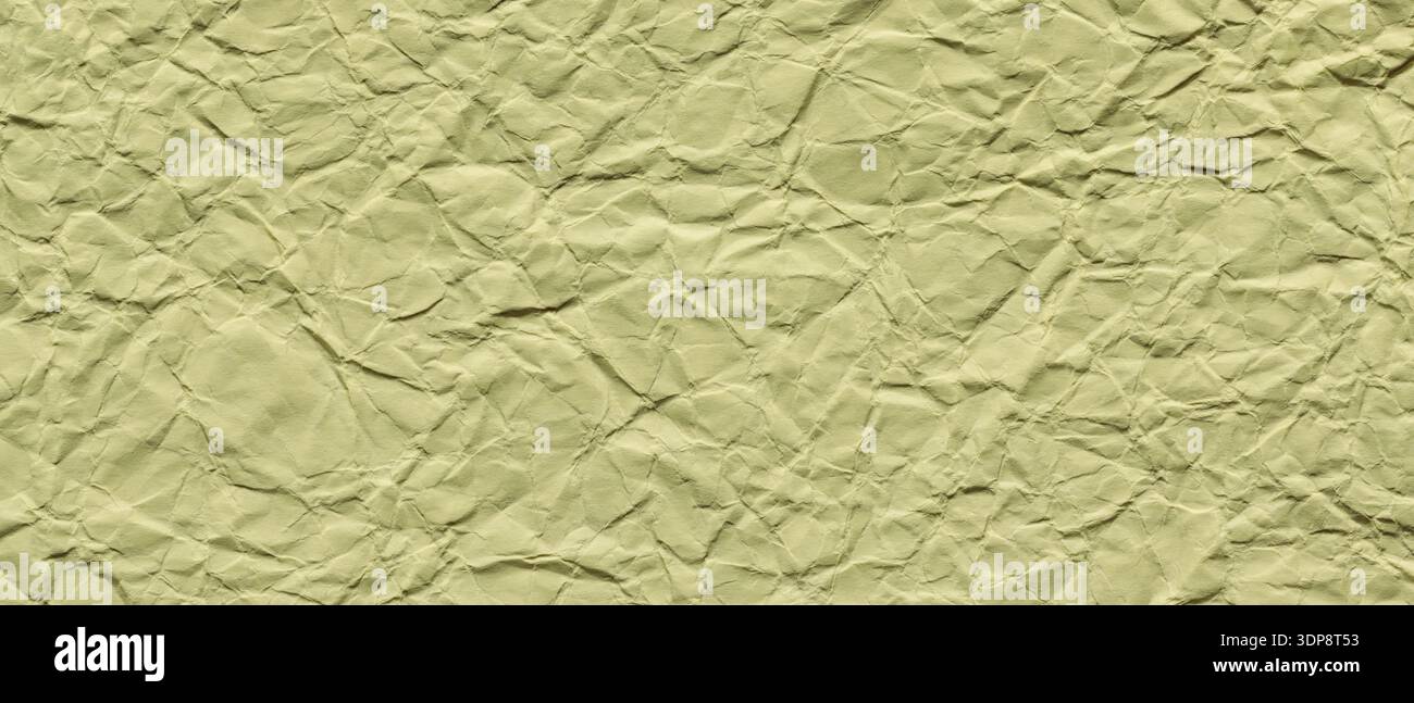 Yellow Crumpled Paper Texture Background with Wrinkled Surface Pattern Stock Photo