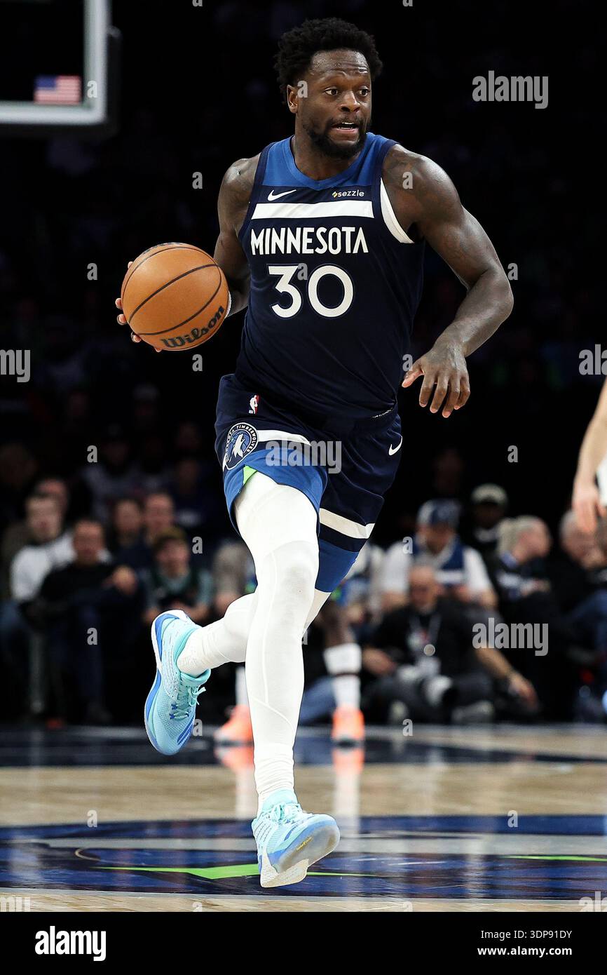 Minnesota Timberwolves forward Julius Randle dribbles the ball up the ...