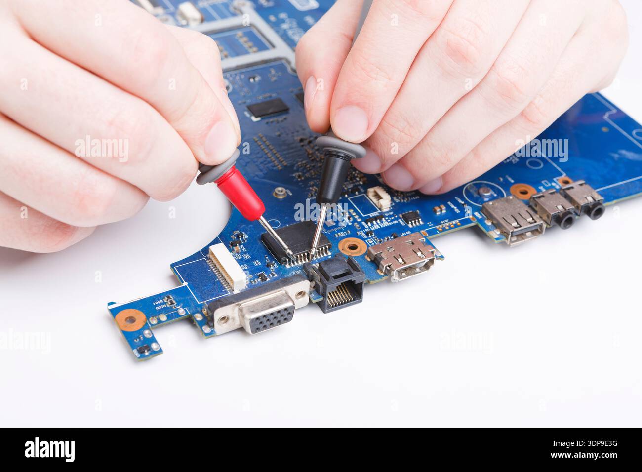 Laptop motherboard testing in service center Stock Photo