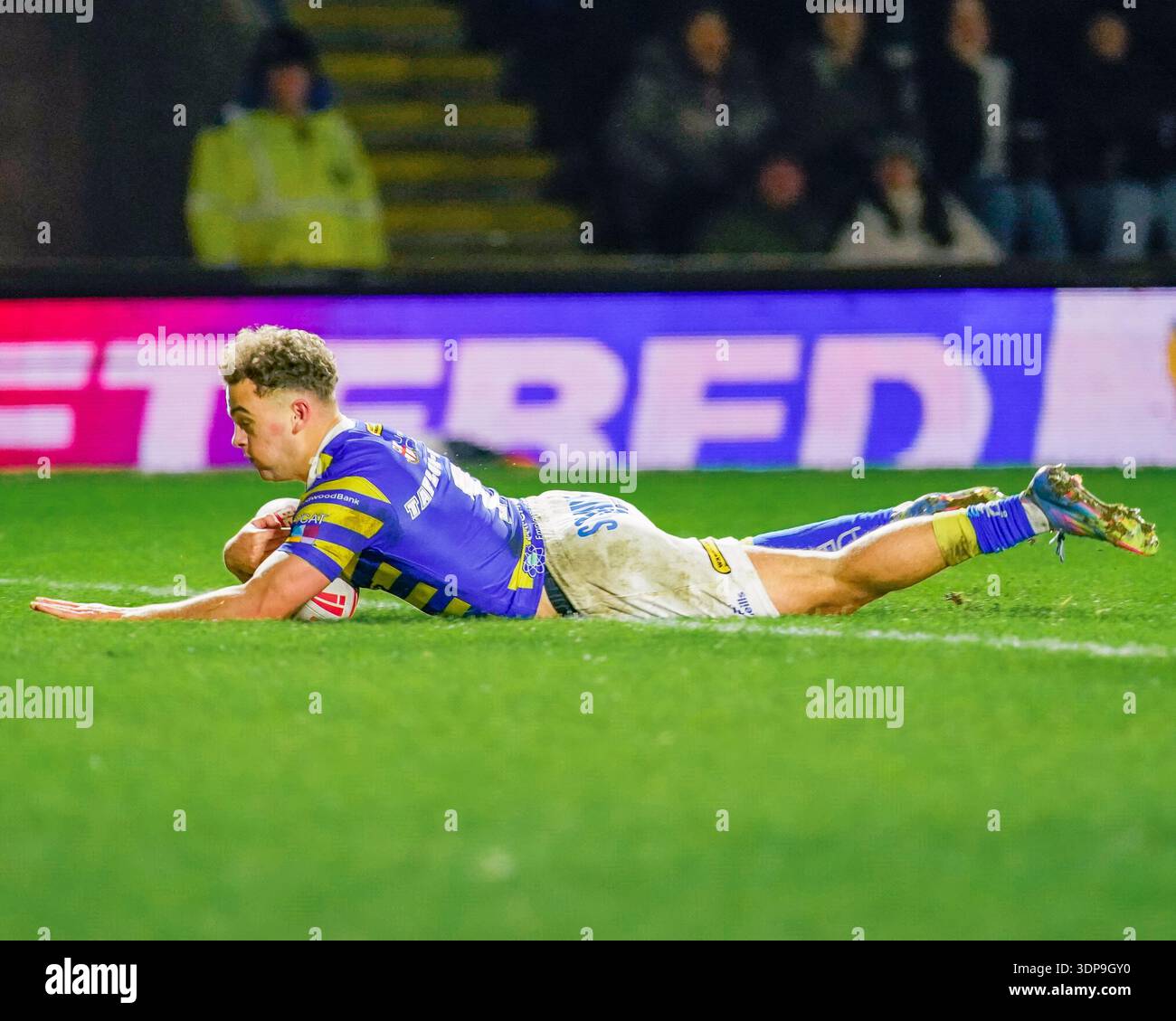 WARRINGTON, ENGLAND - February 13: Cai Taylor-Wray of Warrington scores ...