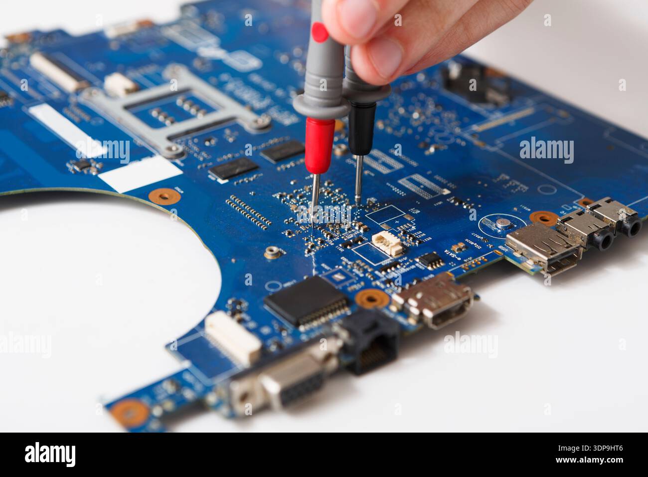 Laptop motherboard testing in service center Stock Photo