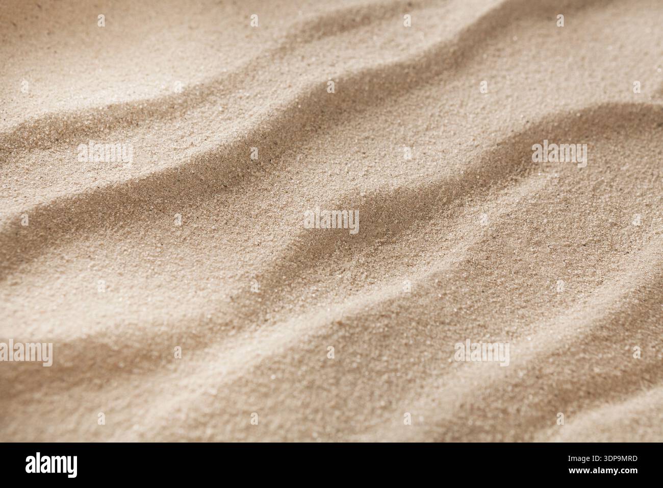 Beach sand background. Natural seashore texture surface Stock Photo