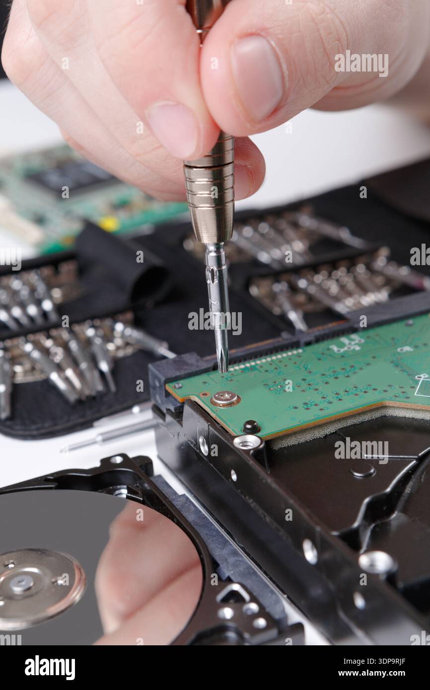 Hard disc drive disassembling close up Stock Photo