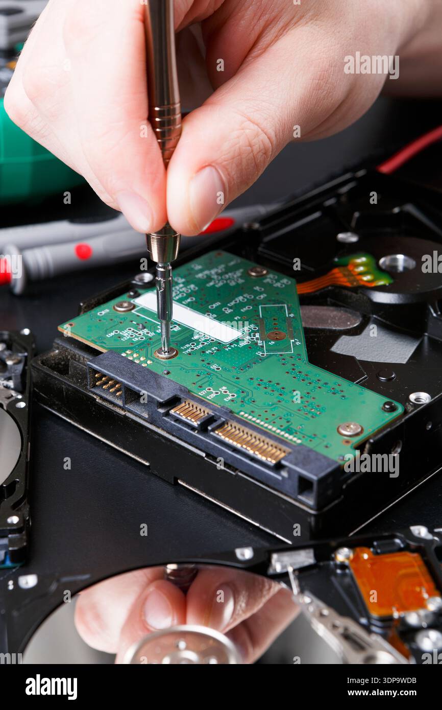 Hard disc drive disassembling close up Stock Photo