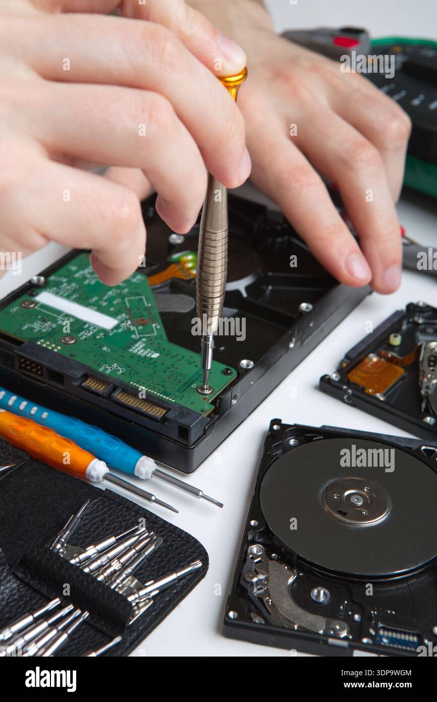 Hard disc drive disassembling close up Stock Photo