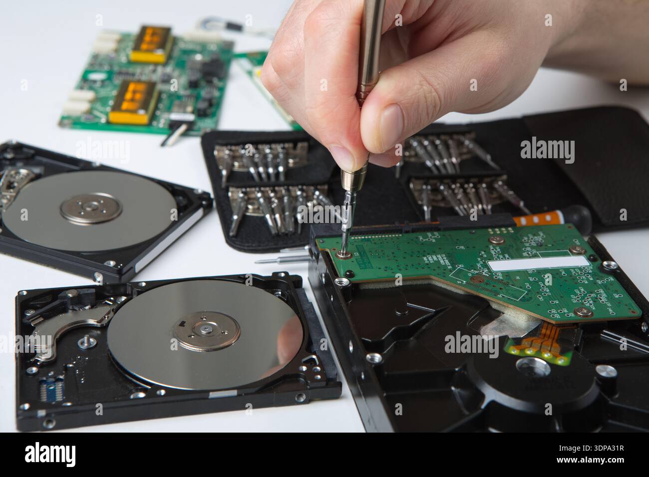 Hard disc drive disassembling close up Stock Photo