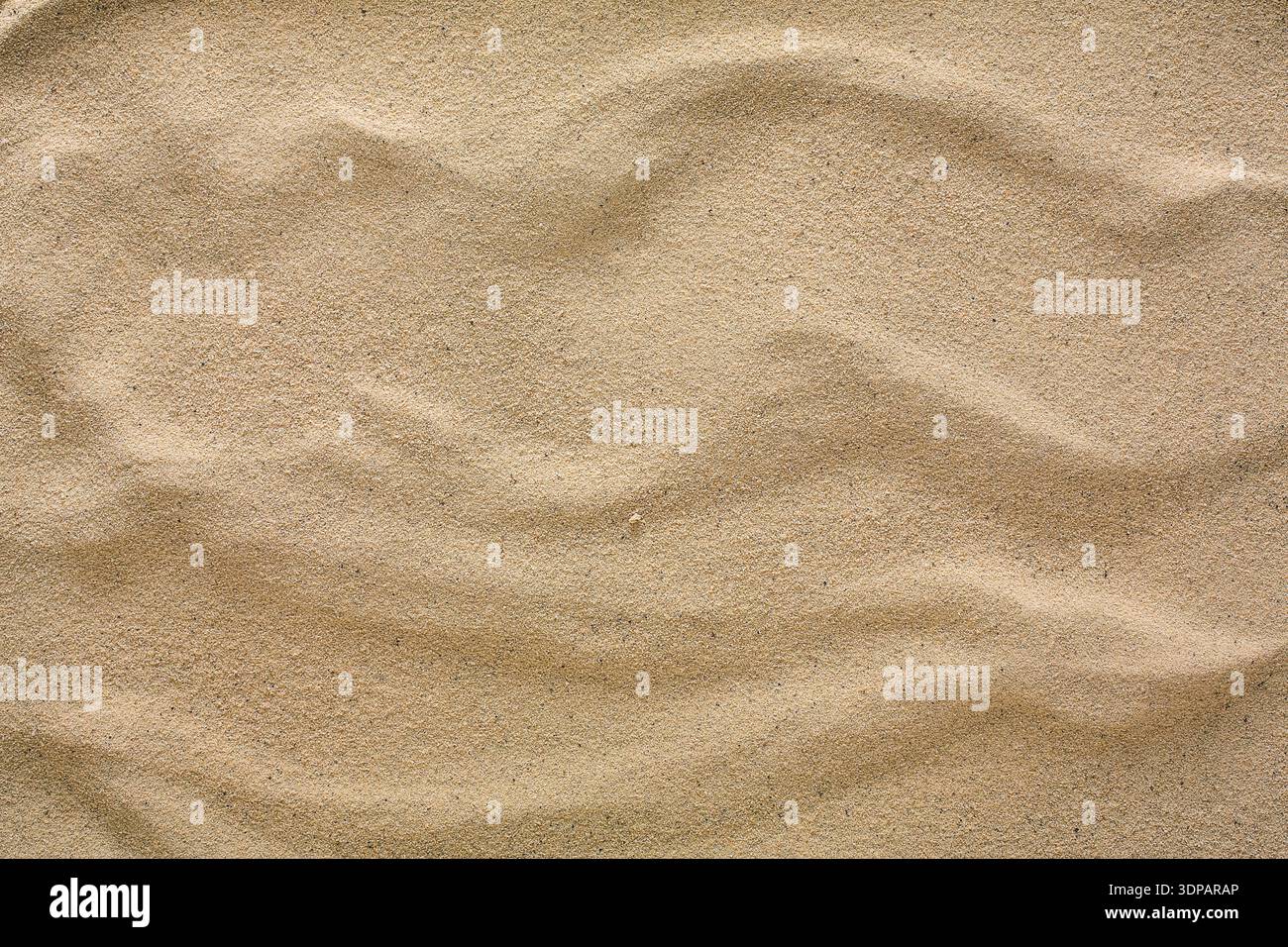 Beach sand background. Natural seashore texture surface Stock Photo