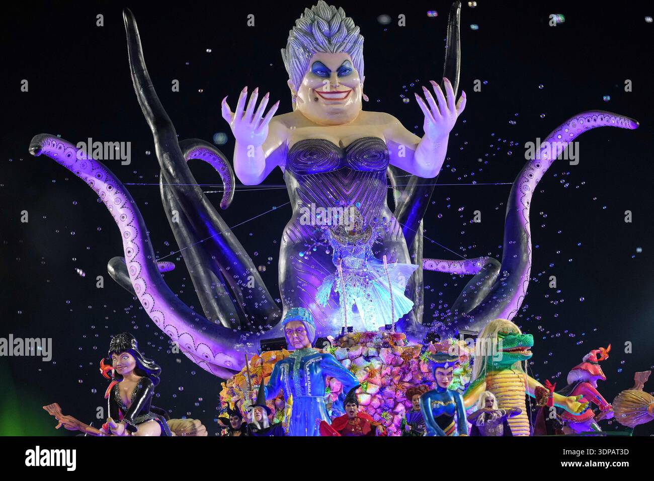 Dancers from the Colorado do Bras samba school perform on a float ...
