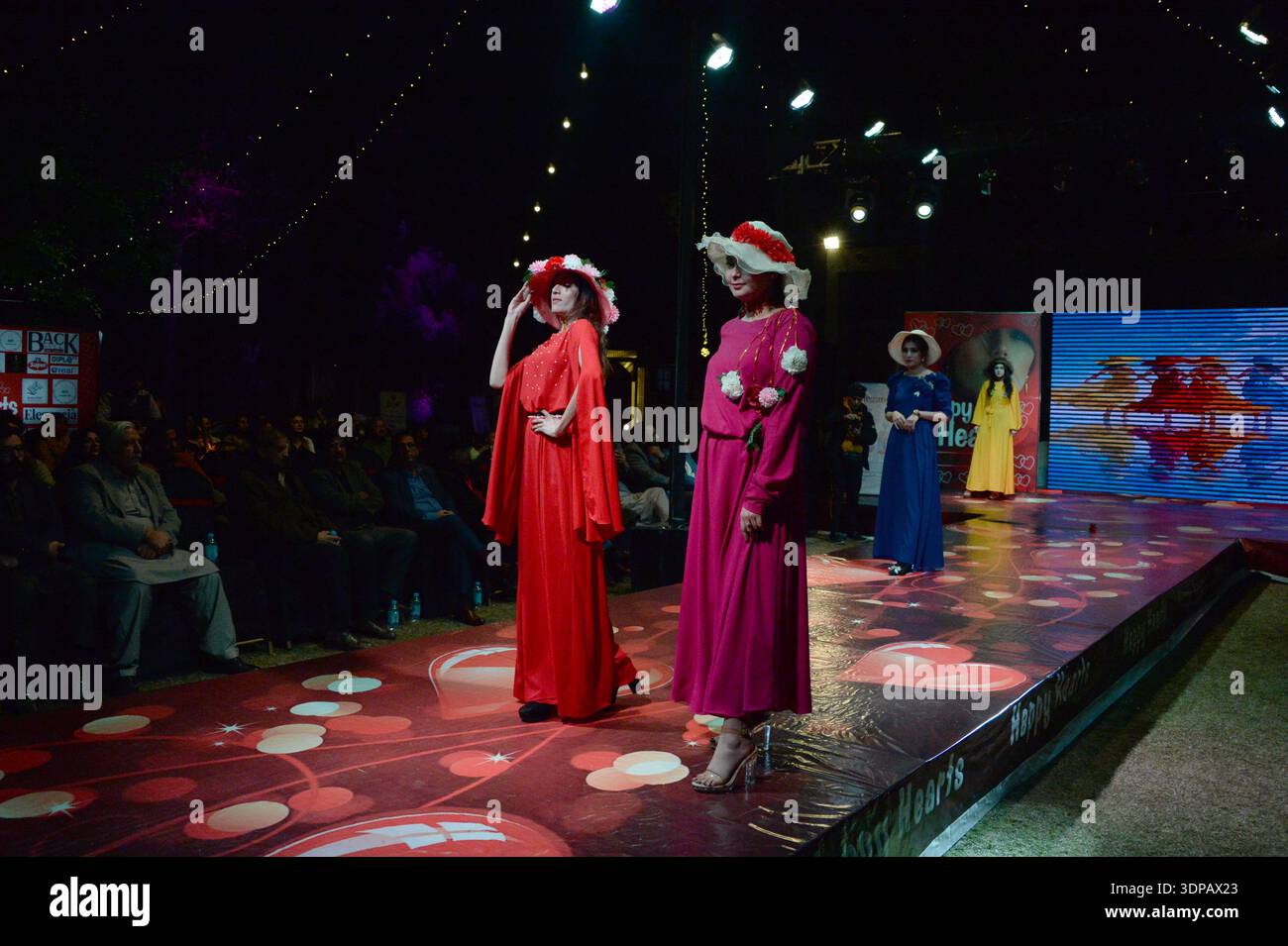 Models present fashion designs during the Fashion Show in Islamabad ...