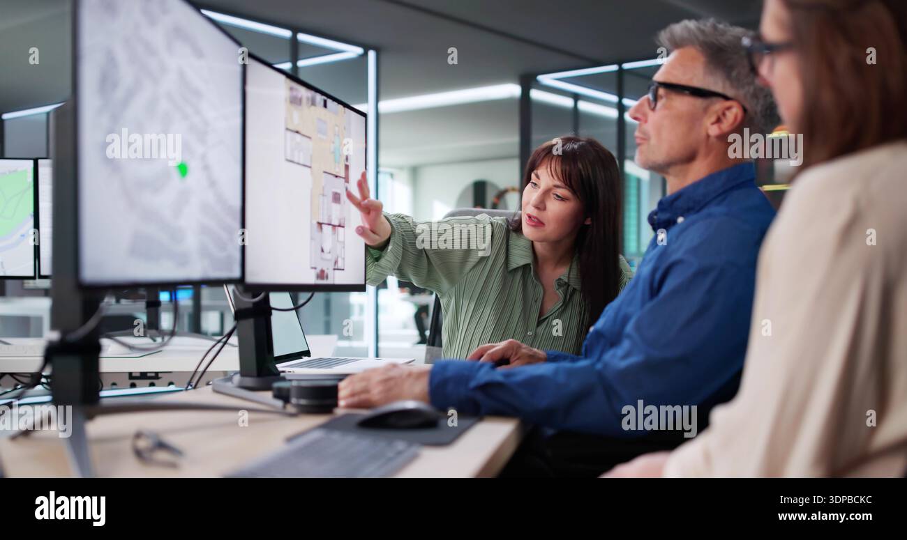 Senior Developer And Planner Use Computer To Measure Land Plot Stock Photo