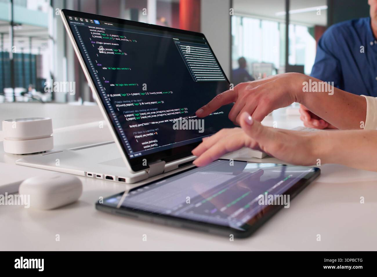 Collaborative Software Development In Modern Office Environment With Diverse Team. Stock Photo