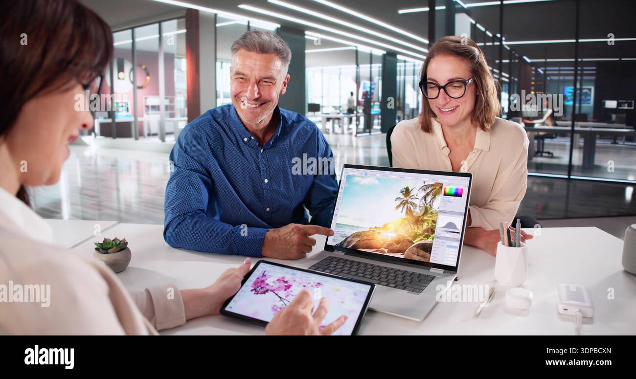 Creative Design: Artist And Photographer Using Computer For Web Graphic Stock Photo