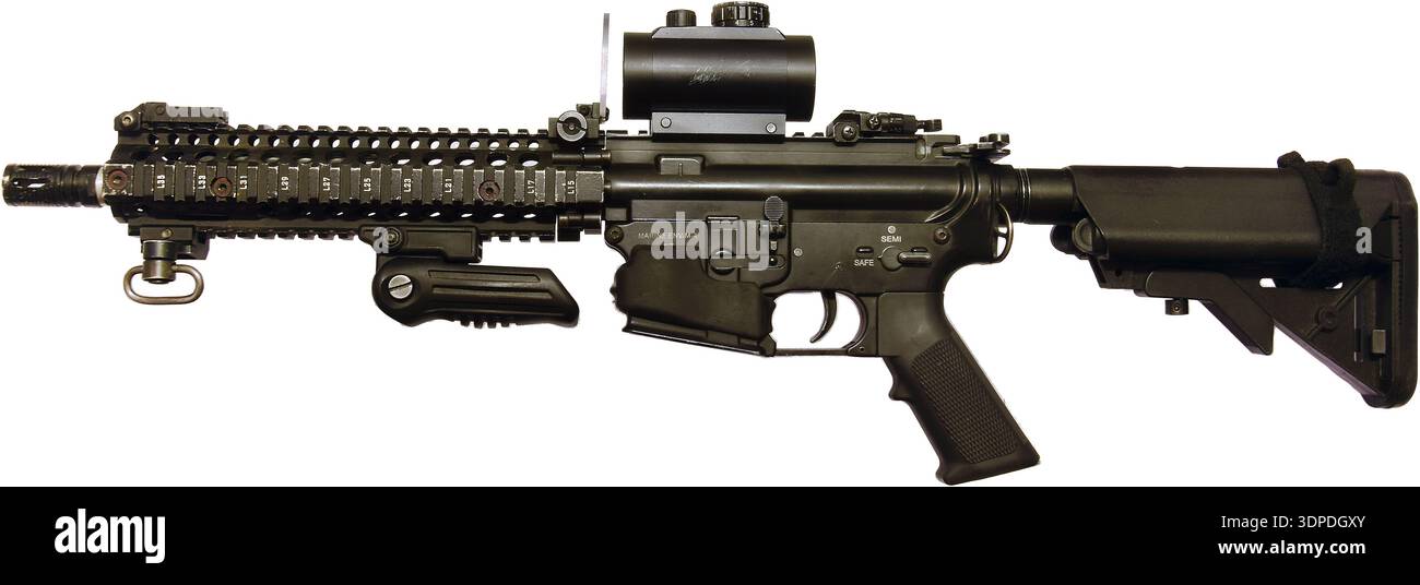 Studio side profile of a modern M4 AR-15 carbine rifle with tactical ...