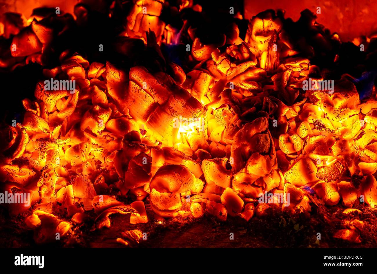 Red hot burning coals as a creative background Stock Photo