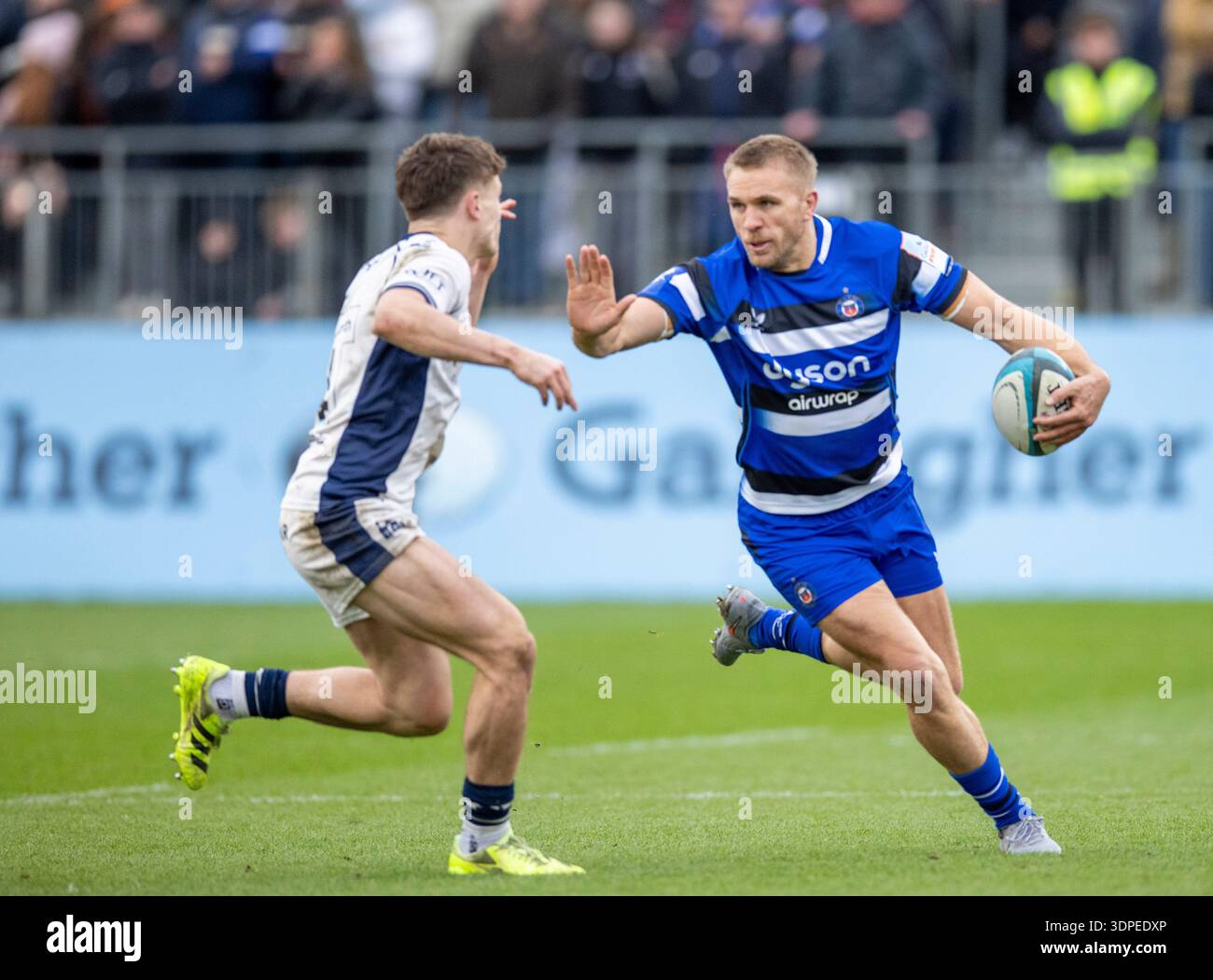 George Harris Rugby Bath Rugby’s Chris Harris hands off Bristol Bears Max Pepper Prem Cup ...