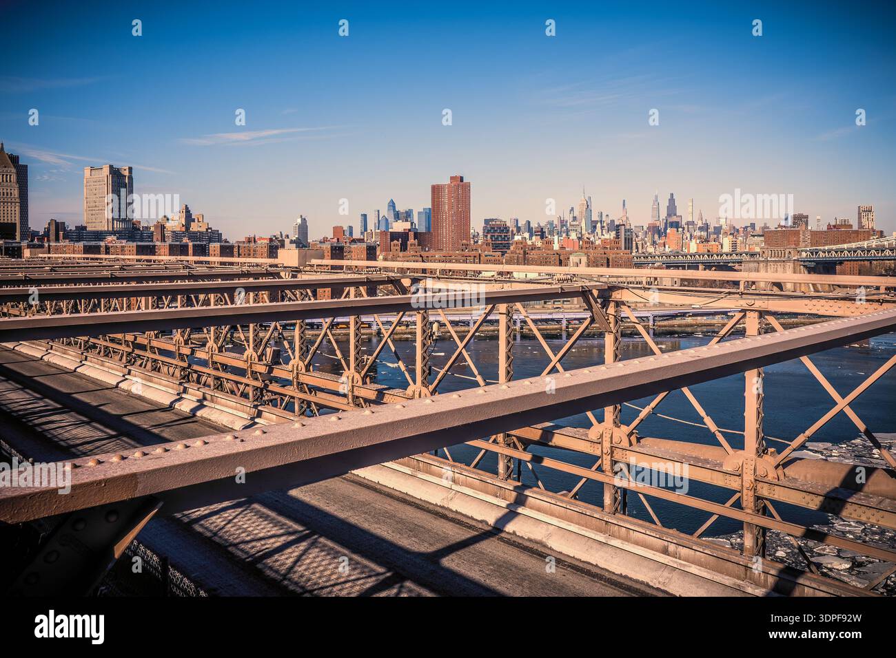 Fantastic view of the famous Brooklyn Bridge crossing the East River in ...