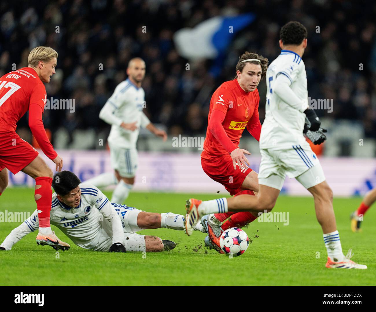 FCK's Junnosuke Suzuki and FC Nordsjaelland's Alexander Lind during the ...