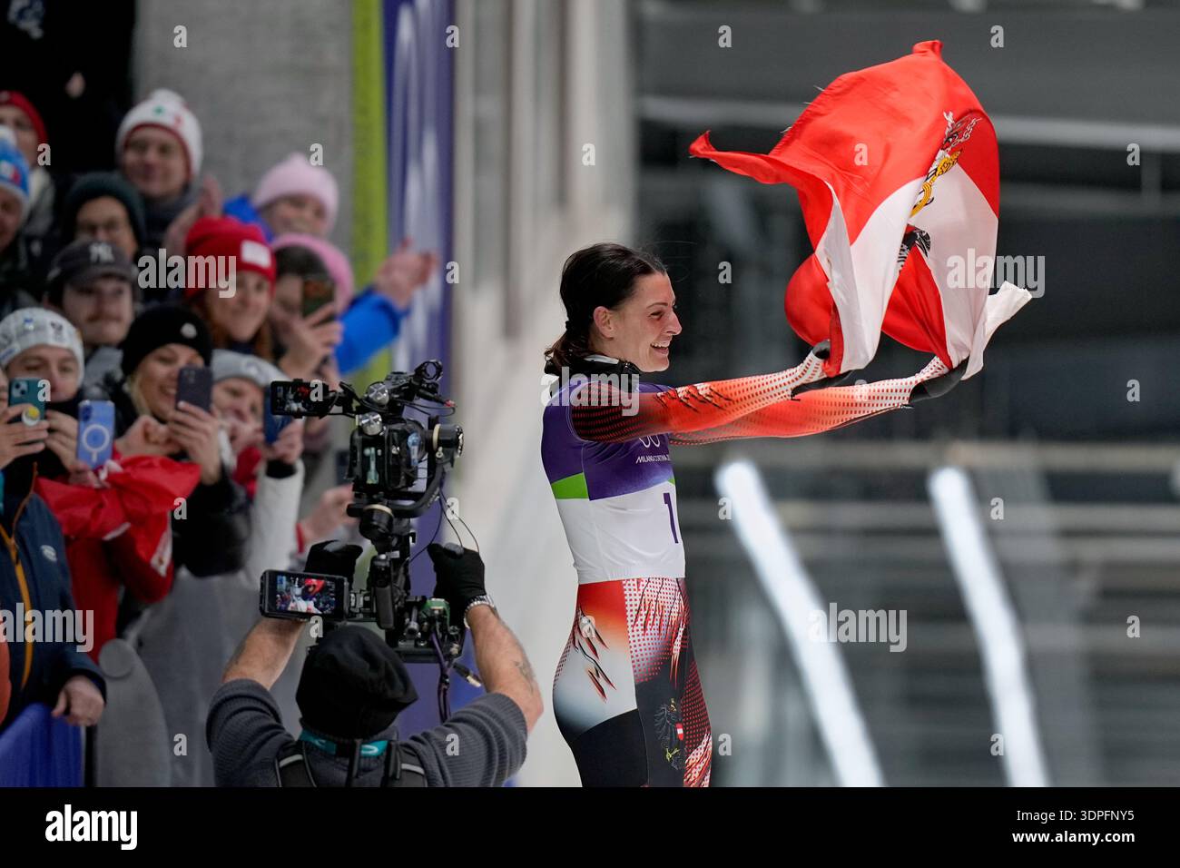 Austria's gold medalist Janine Flock celebrates as she arrives at the ...