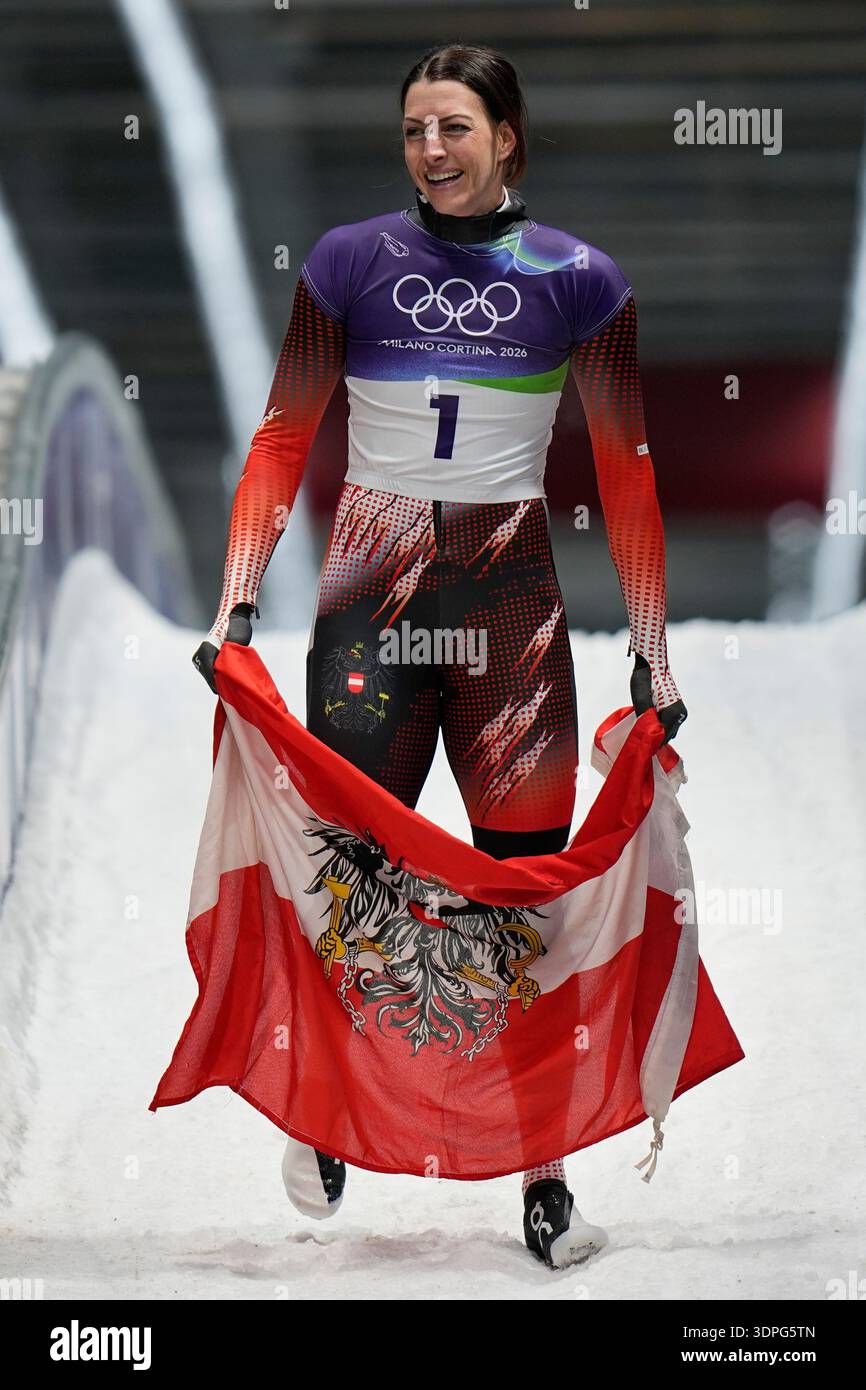 Austria's gold medalist Janine Flock celebrates as she arrives at the ...