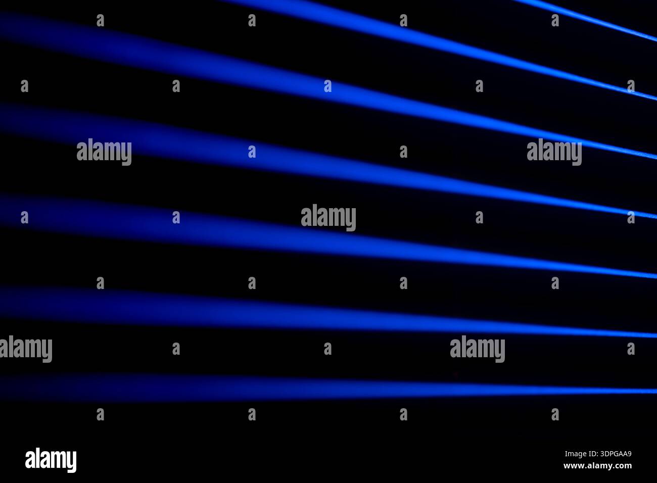 Blue light stripes with deep perspective. Neon stripes. Stock Photo