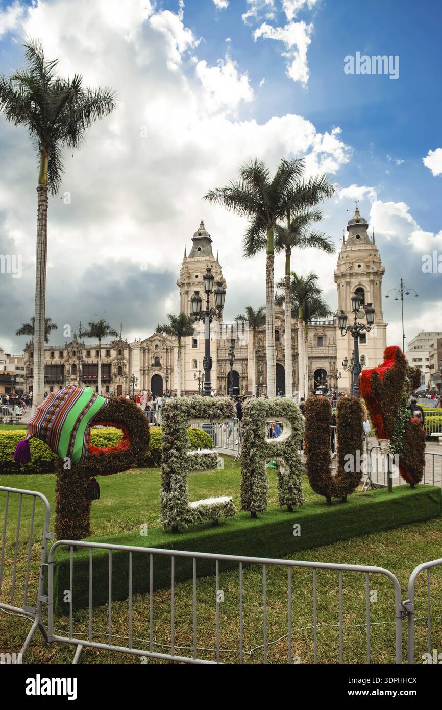 Peru lettering with flowers, basilica, Plaza de Armas, Lima city center, Peru Stock Photo