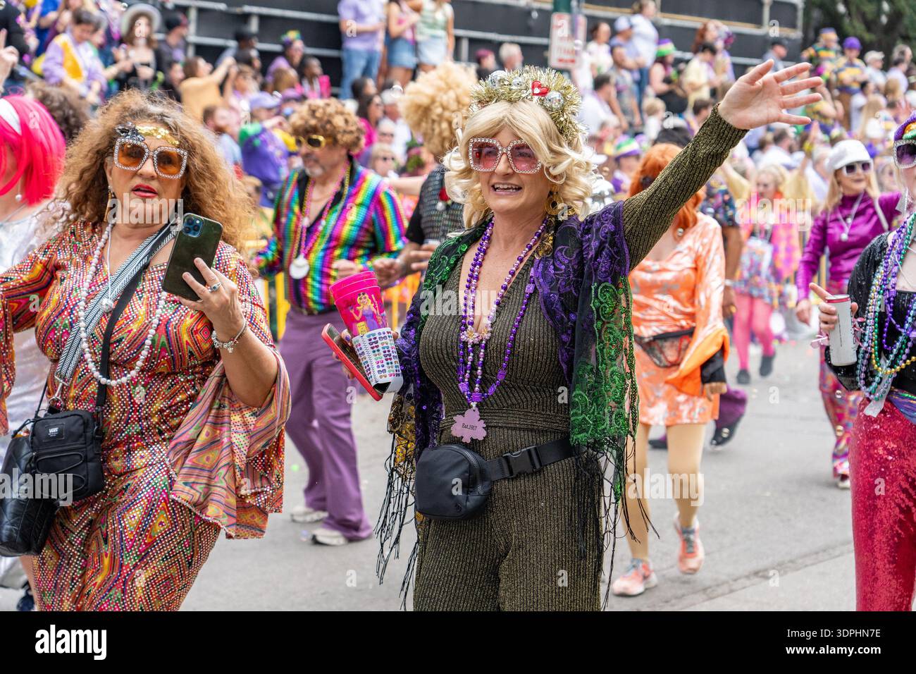 Isis Parade Attendees march during the annual Krewe of Iris parade during the Mardi ...