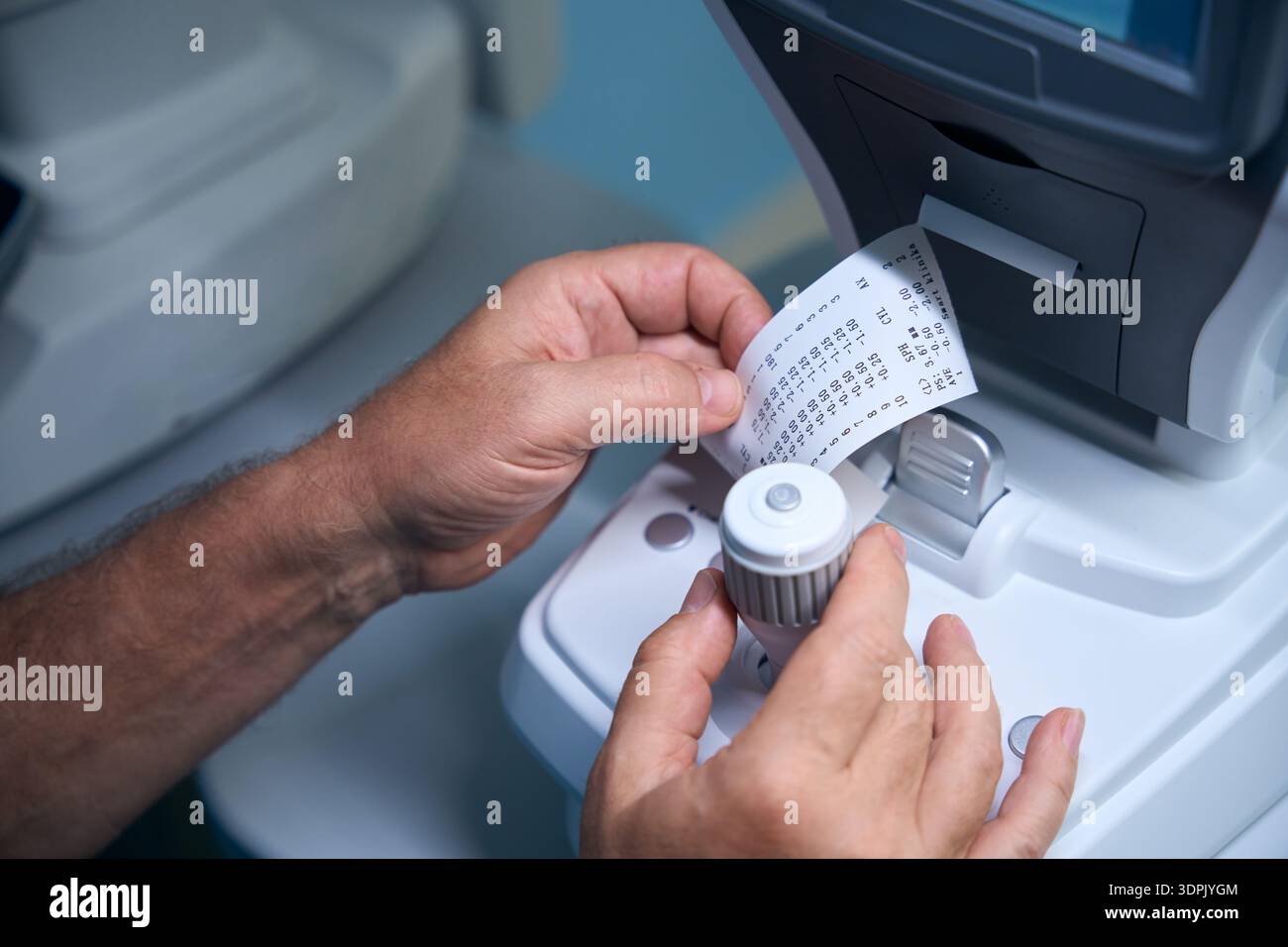 Doctor hands using optical medical devices for ophthalmology Stock ...