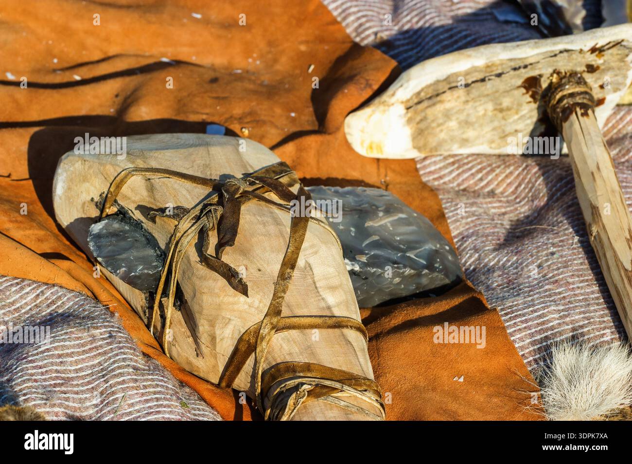 Flint ax and a bone club Stock Photo
