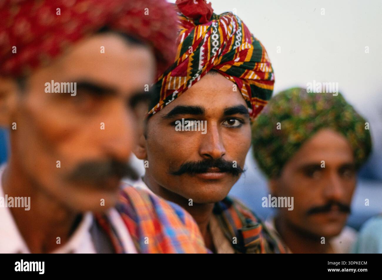 Men in Pakistan wearing traditional turbans, distinctive ceremonial head coverings commonly worn for weddings, festivals, and cultural celebrations. Stock Photo