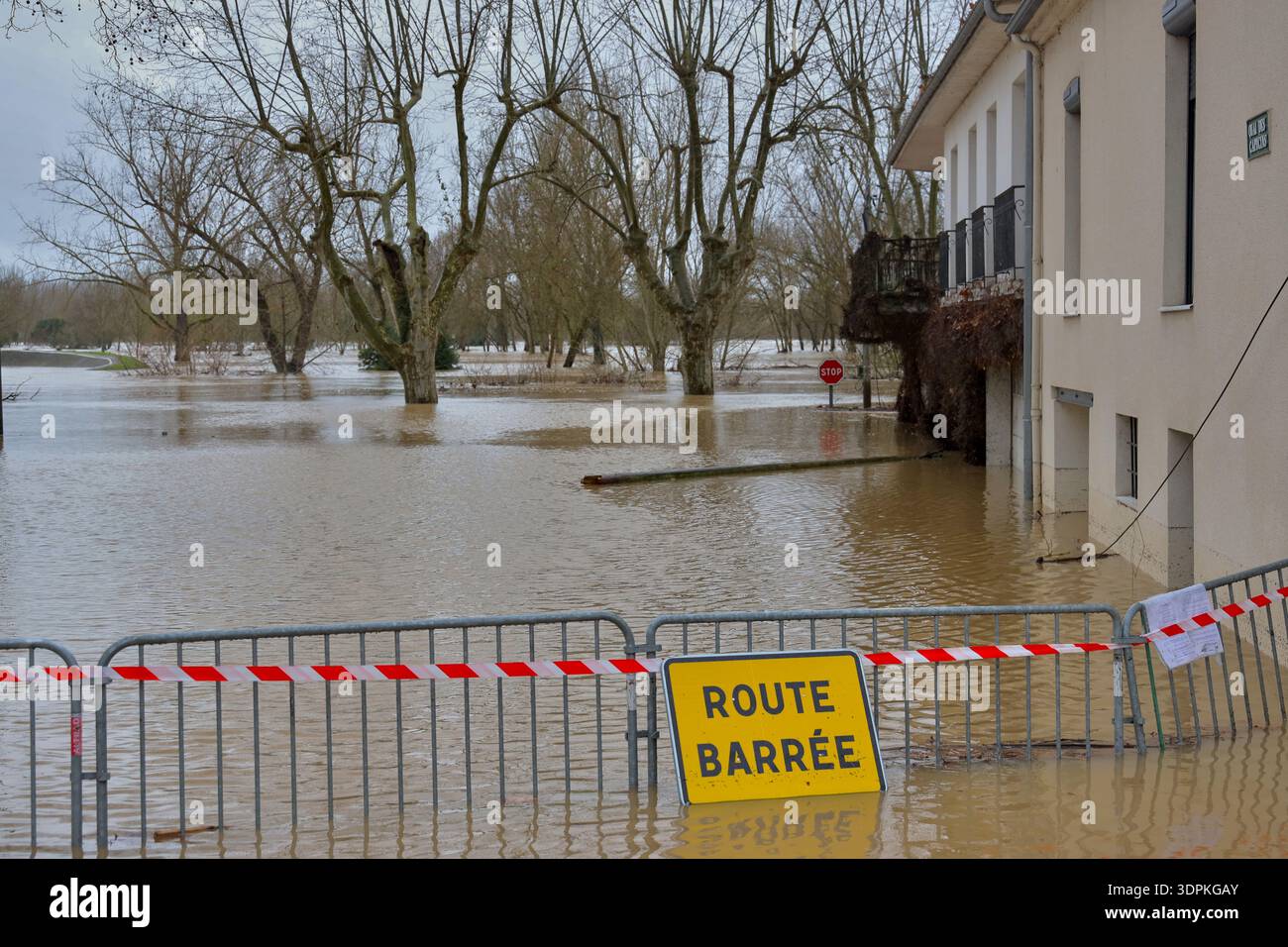 The access is blocked to a flooded road in Marmande, as severe flooding ...