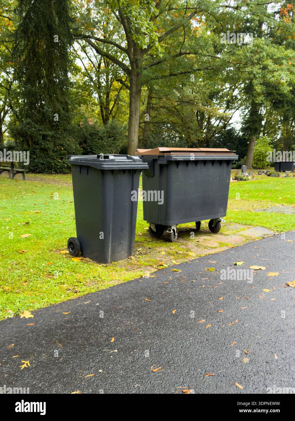 Modern Waste Recycling Bins in Public Park Stock Photo - Alamy