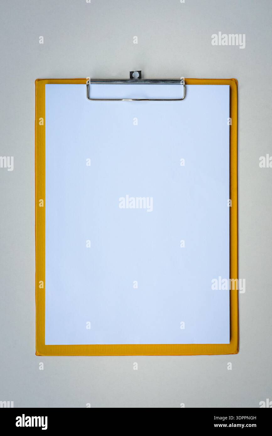Clipboard with A4 papers blank. Isolated on white background. Stock Photo