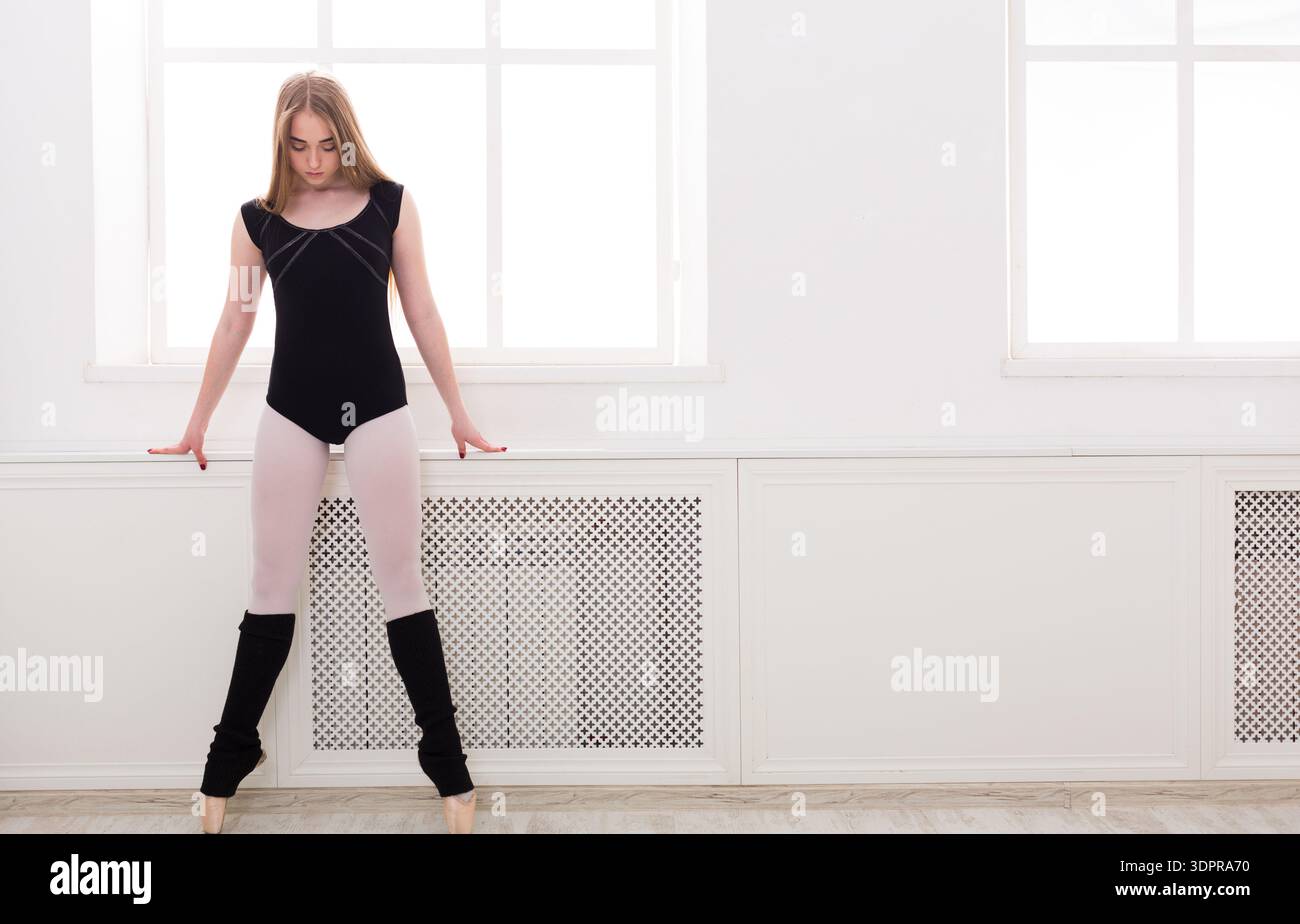 Dancer Practicing in a Studio With Natural Light During the Day Stock Photo
