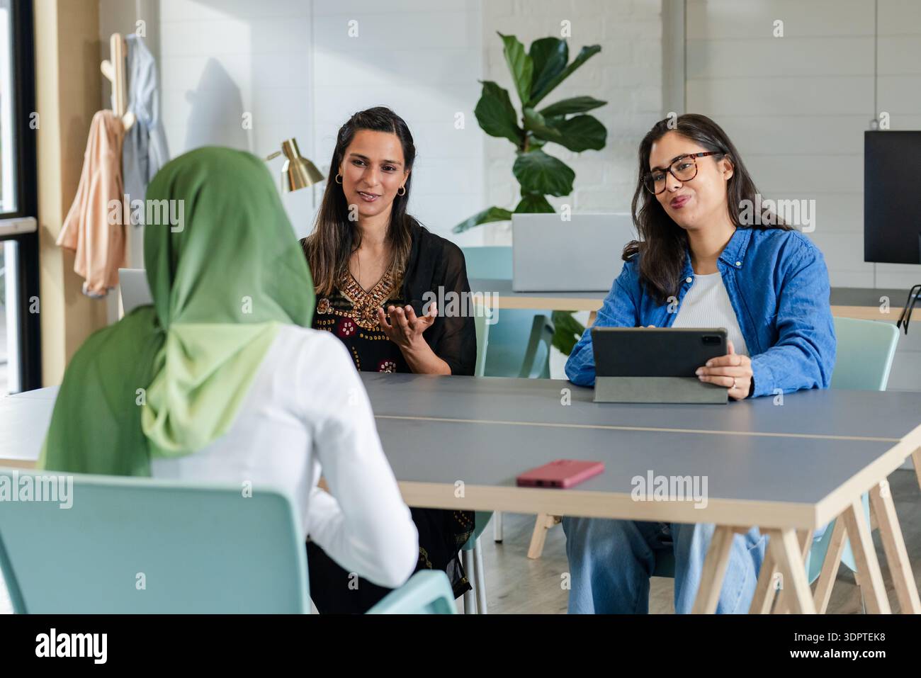 Diverse panel women conducting hi-res stock photography and images - Alamy