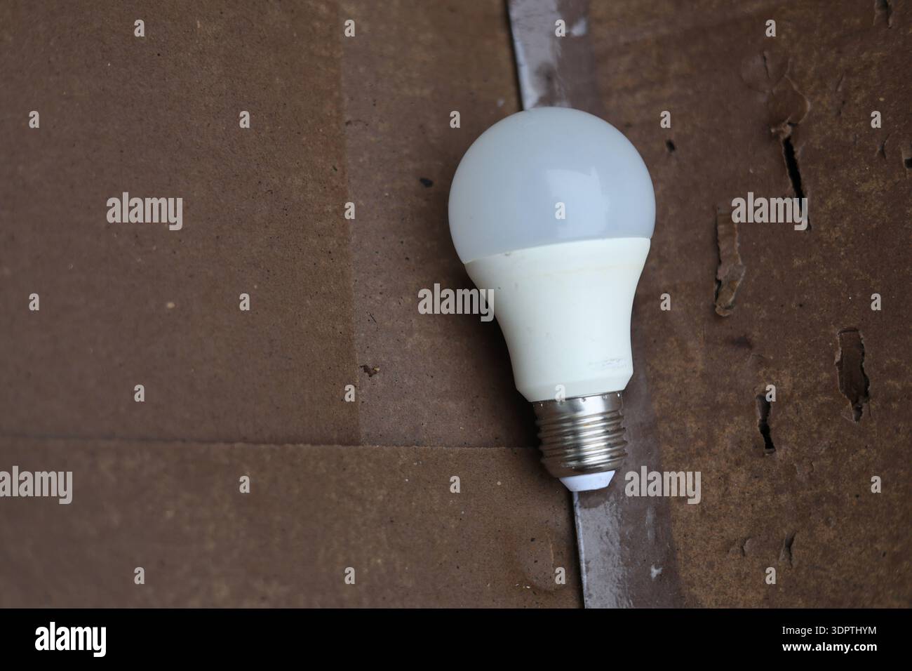 Electric led economy light bulb concept shot Stock Photo - Alamy