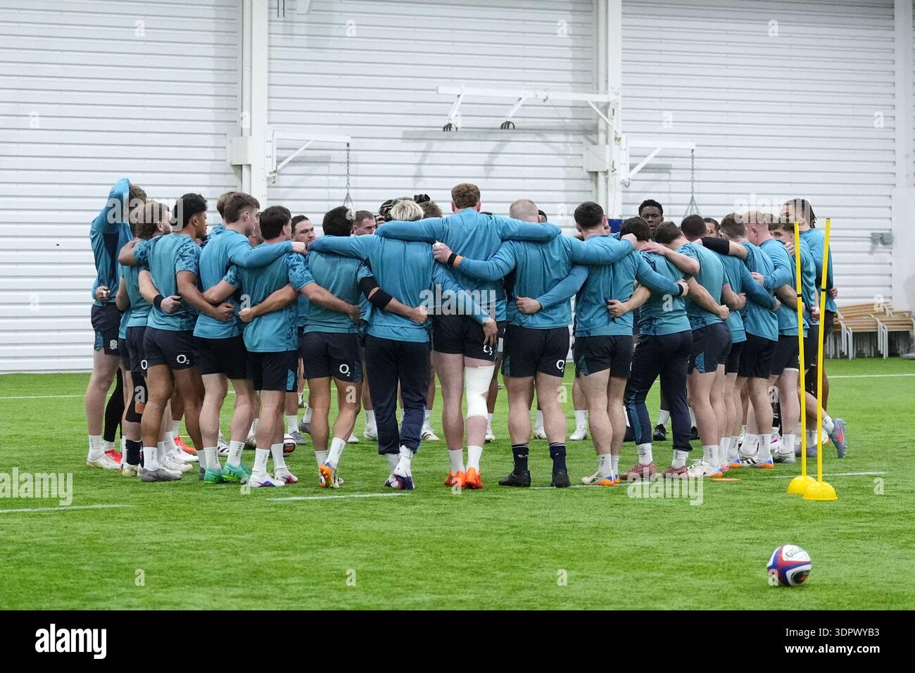 The England players huddle up during a training session at the England ...