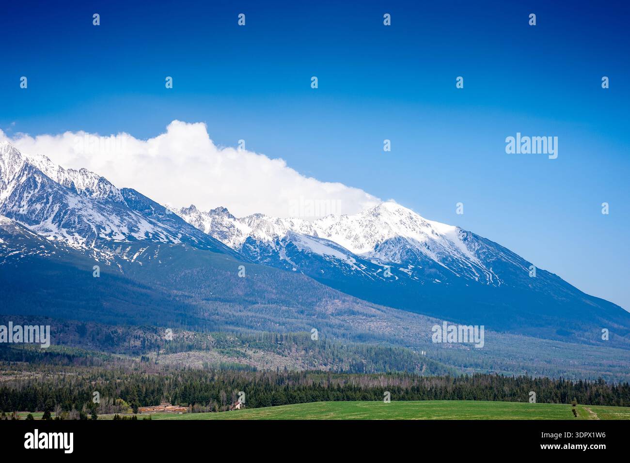 snow capped mountain peaks of high tatras in spring. scenic view of popular travel destination for remote trekking in slovakia, europe. alpine landsca Stock Photo