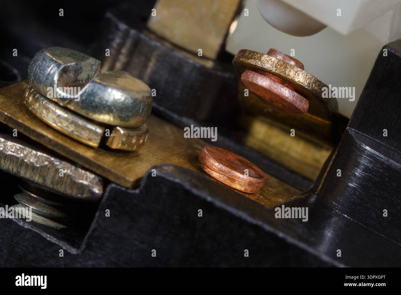 Copper contacts of a mechanical light switch. Macro photo. Stock Photo