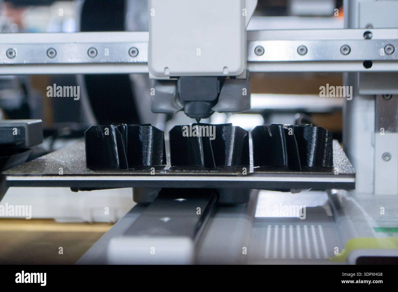 3D printer. 3D printer printing object close-up. 3D printer printing ...