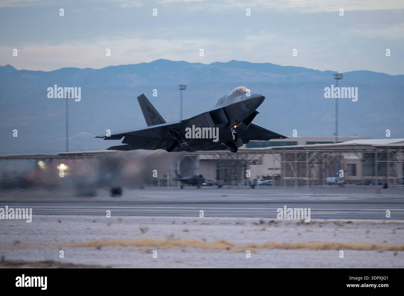 An F-22 Raptor, assigned to the 422nd Test and Evaluation Squadron ...