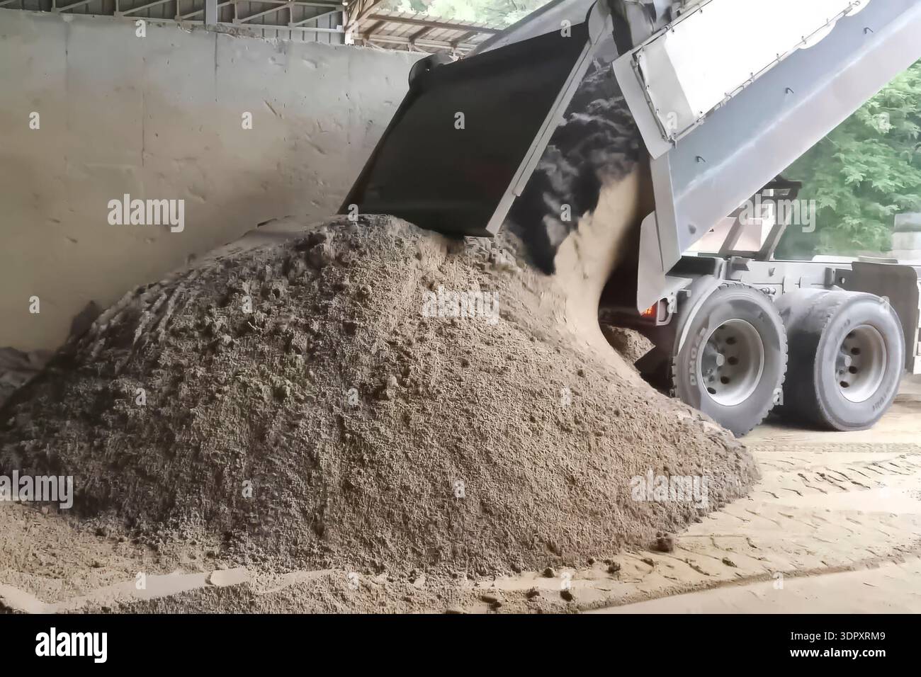 Sand Unloader Dump truck unloading sand hi-res stock photography and images - Alamy