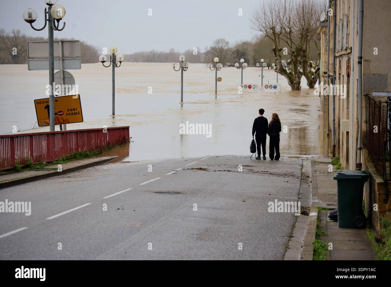 People look at the Garonne river as severe flooding hits western France ...