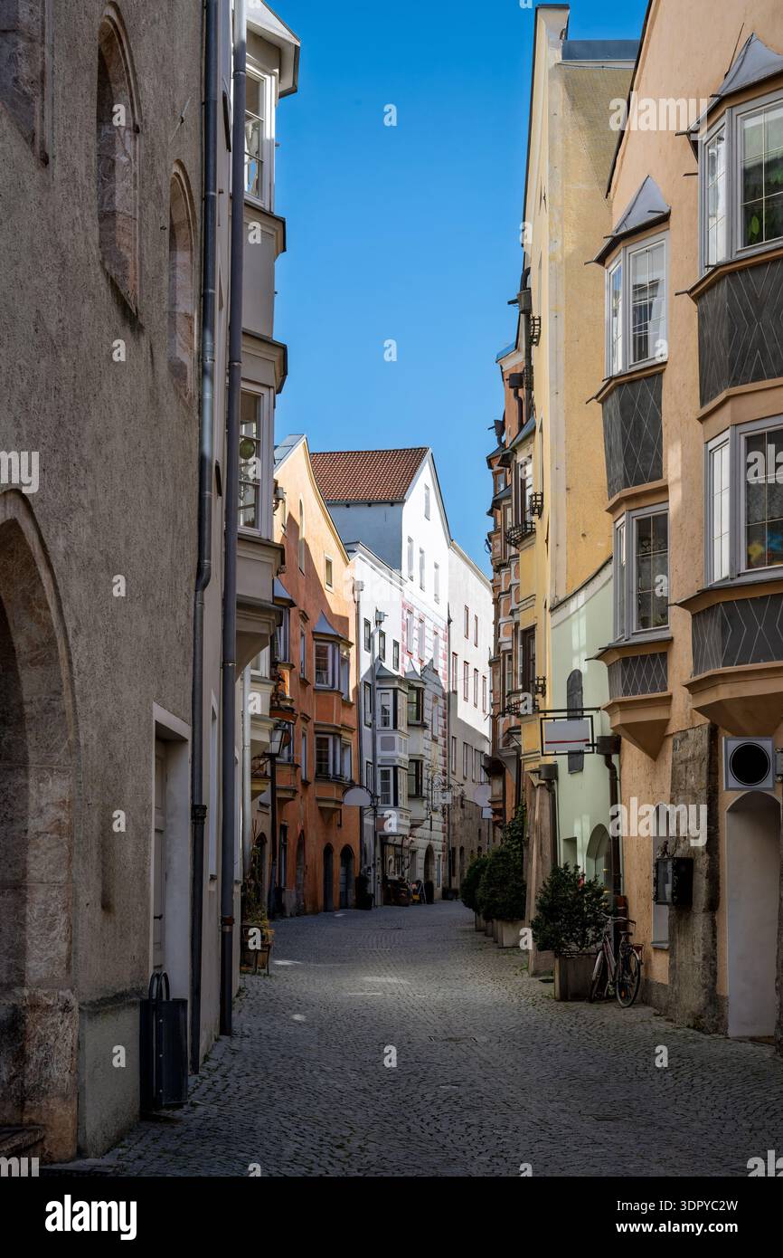 Narrow alley in the old town of the city Hall in Tirol (Austria) Stock Photo