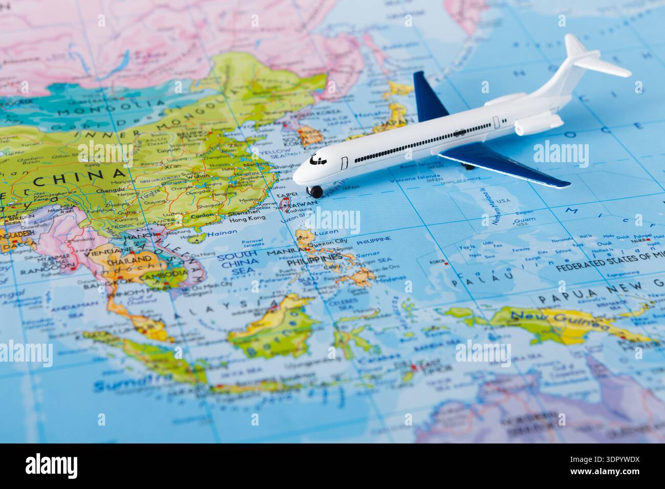 Model Airplane on a Map of Asia Showing Major Countries and Cities ...
