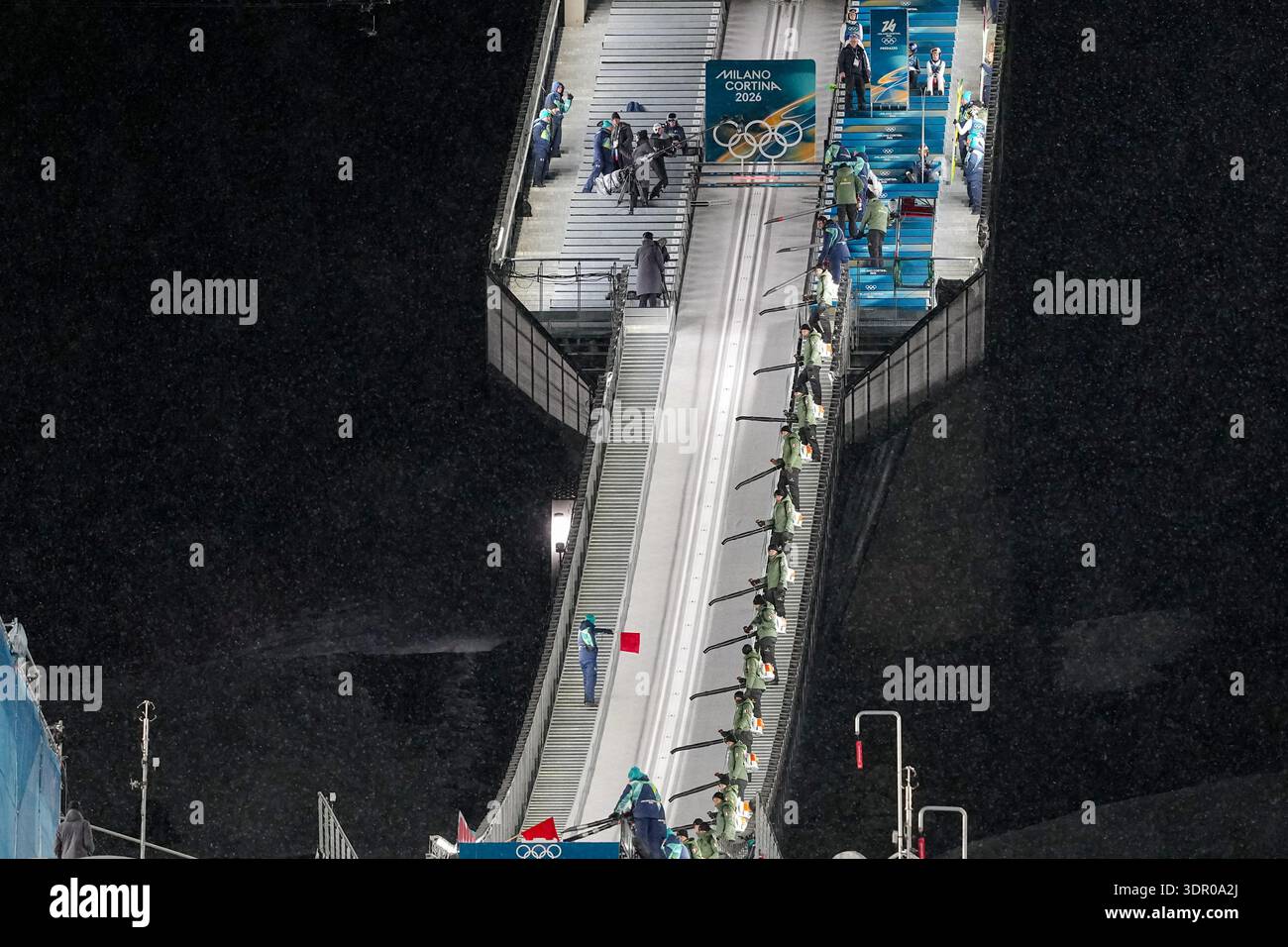 Snow blowers are used on the ramp during the final round of the ski ...