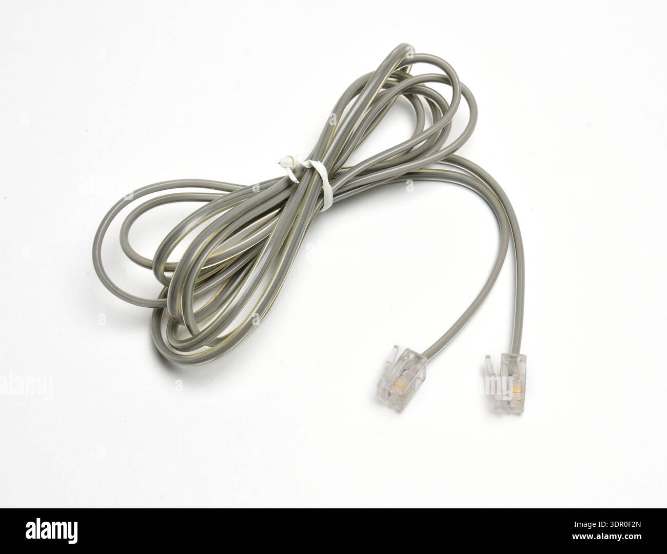 Multiple Line Telephone Cable Rj Cable with Rj 11 plug for a telephone line on an isolated white ...