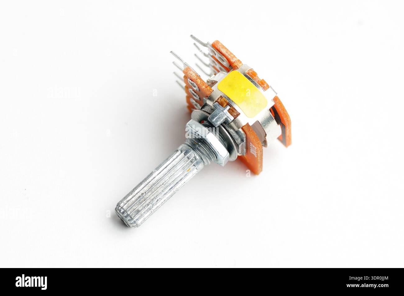 Variable resistor, potentiometer on isolated white background Stock Photo