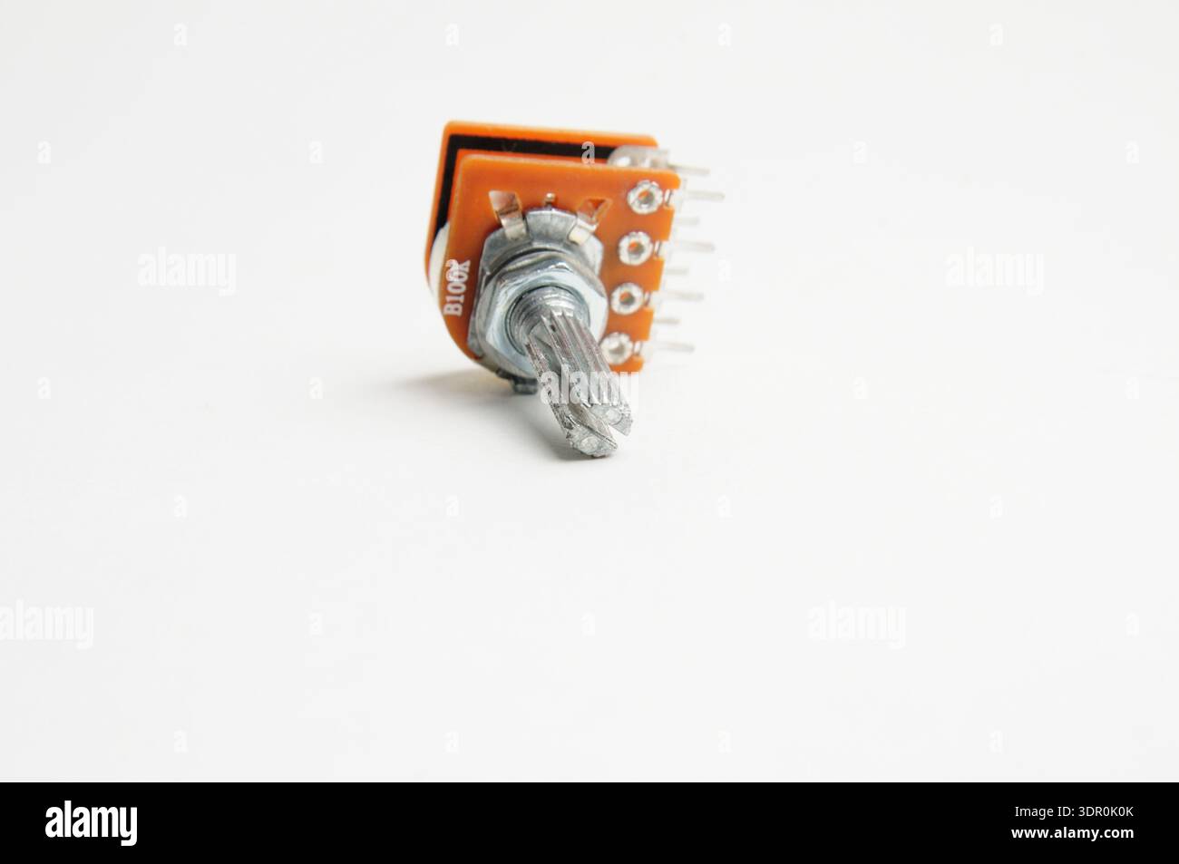Variable resistor, potentiometer on isolated white background Stock Photo