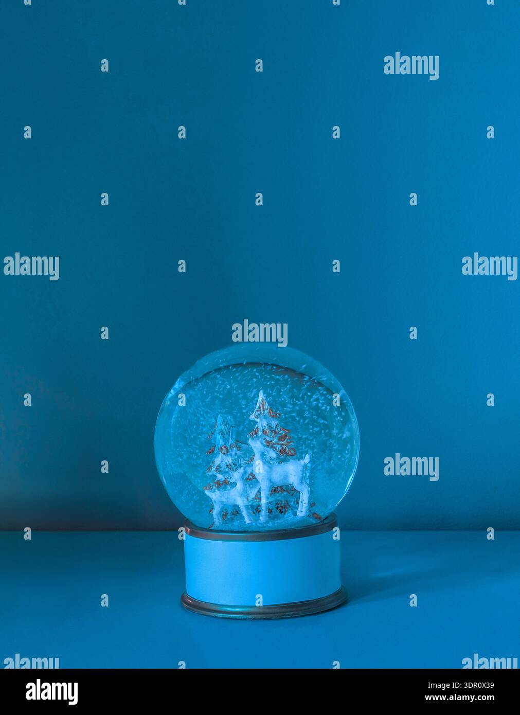 Snow globe - wintery festive scene Stock Photo